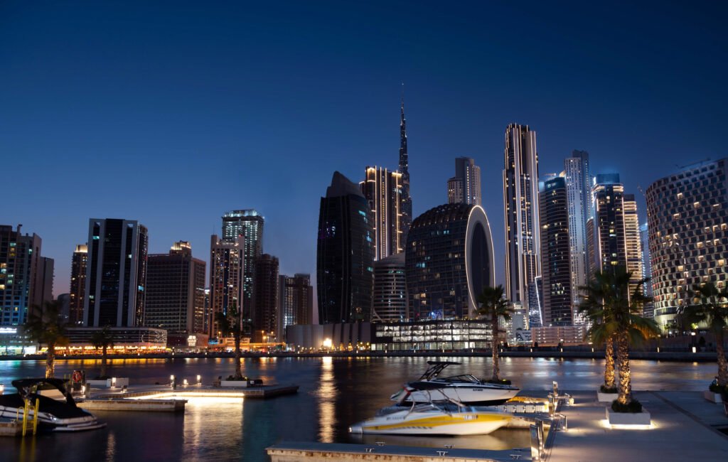 March 5th,2021, Dubai,UAE. View of the illuminated cruise ships lined up along with Burj khalifa and other sky scrappers captured from the Marasi drive at the Business bay district, Dubai, UAE.